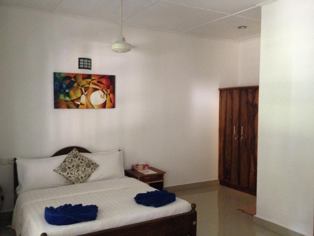 Fire Dragon Hideaway Hotell Negombo Rom bilde