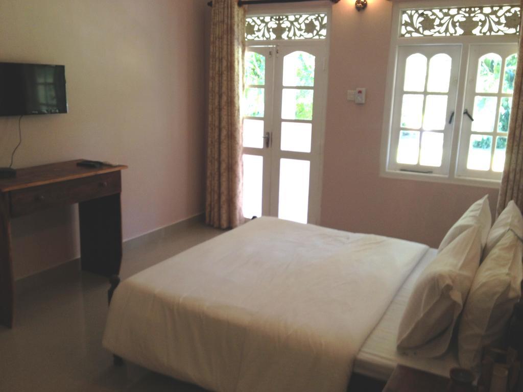 Fire Dragon Hideaway Hotell Negombo Rom bilde